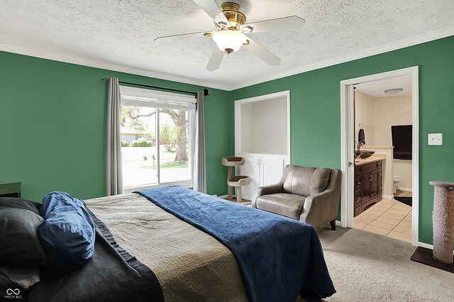 601 Shady Ln, Greenwood, IN 46142 - bedroom with light carpet, access to outside, a textured ceiling, a ceiling fan, and ensuite bath