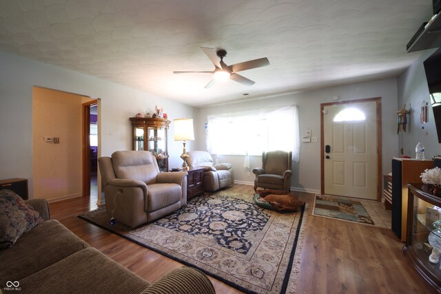 5041 Norcroft Dr, Indianapolis, IN 46221 - living room featuring baseboards, a ceiling fan, and wood finished floors