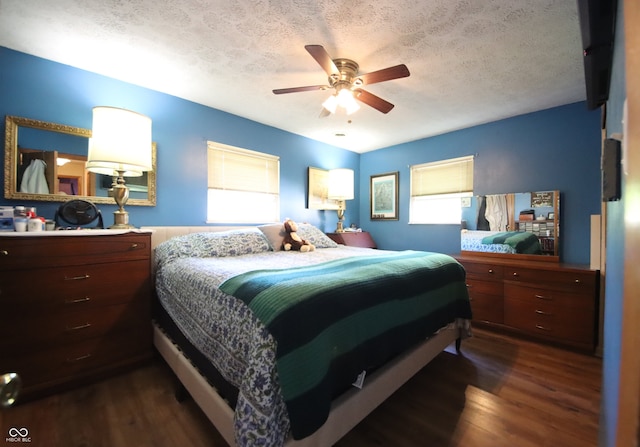 5041 Norcroft Dr, Indianapolis, IN 46221 - bedroom featuring dark wood-type flooring, a ceiling fan, and a textured ceiling