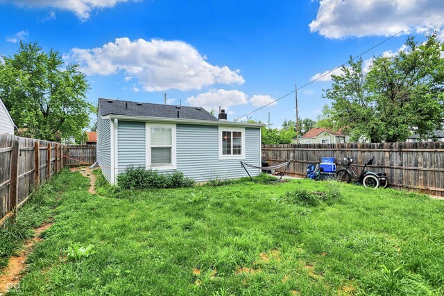 1641 Iowa St, Indianapolis, IN 46203 - rear view of property with a chimney