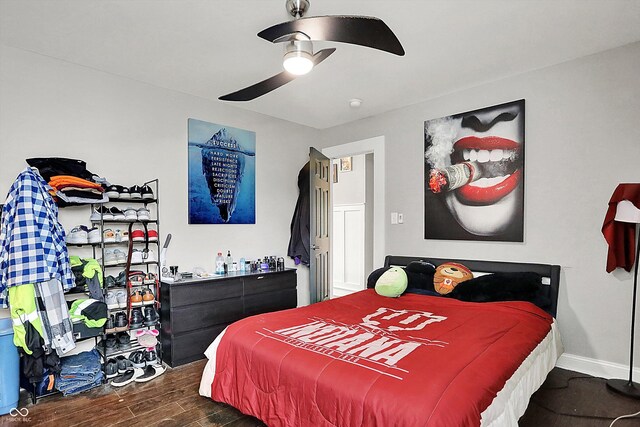 1641 Iowa St, Indianapolis, IN 46203 - bedroom featuring wood finished floors, a ceiling fan, and baseboards
