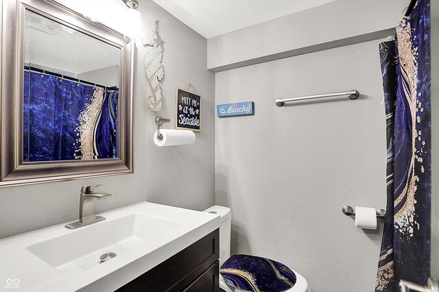 1641 Iowa St, Indianapolis, IN 46203 - bathroom featuring vanity and toilet