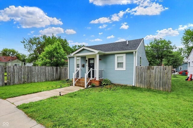 1641 Iowa St, Indianapolis, IN 46203 - view of front facade with a shingled roof