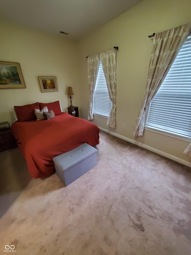 1050 Jefferson Ave, Indianapolis, IN 46201 - bedroom featuring carpet flooring, baseboards, and visible vents