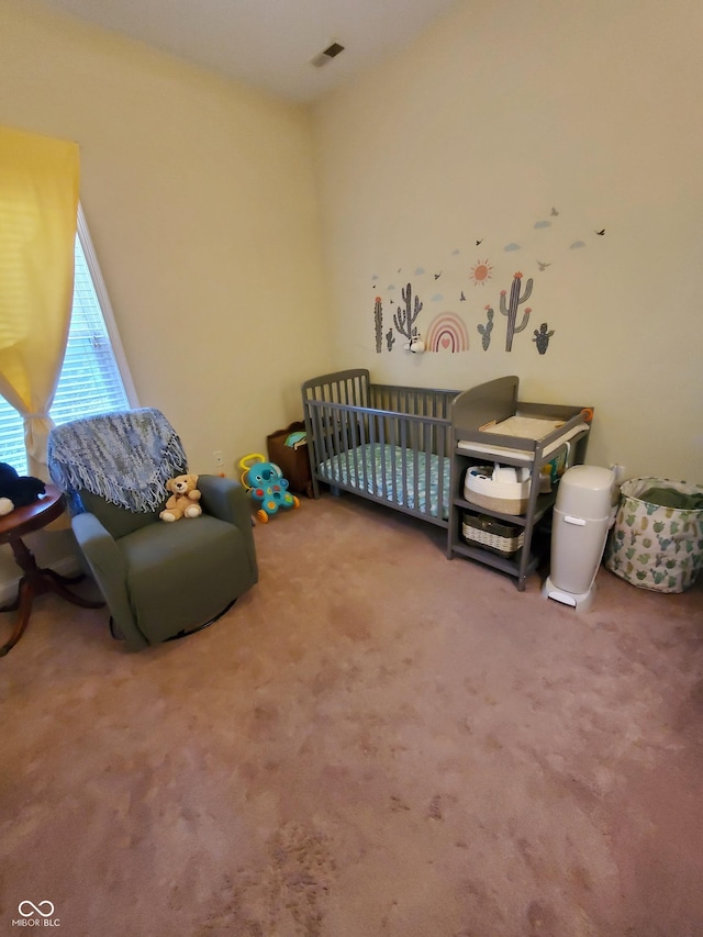 1050 Jefferson Ave, Indianapolis, IN 46201 - bedroom with a nursery area, carpet, and visible vents