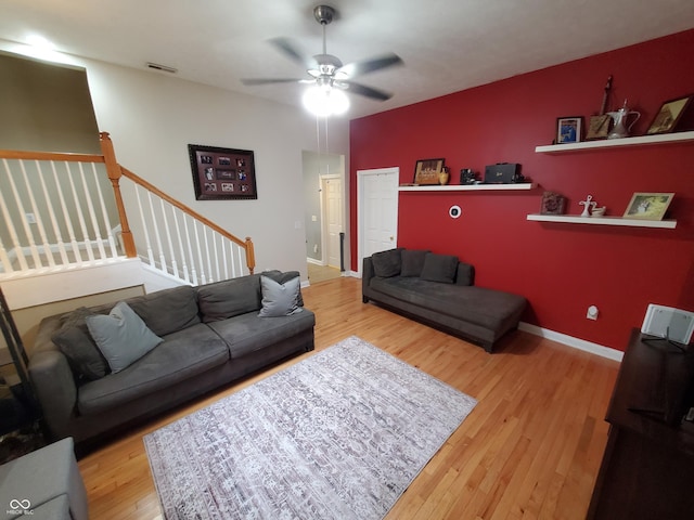 1050 Jefferson Ave, Indianapolis, IN 46201 - living area with baseboards, ceiling fan, wood finished floors, and visible vents