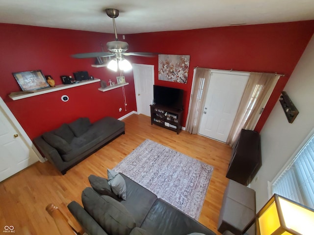 1050 Jefferson Ave, Indianapolis, IN 46201 - living area featuring ceiling fan and wood finished floors