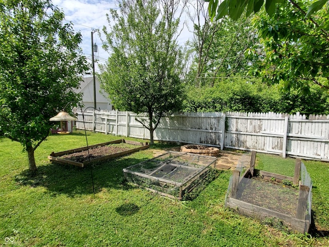 1050 Jefferson Ave, Indianapolis, IN 46201 - view of yard with fence, a gazebo, and a vegetable garden
