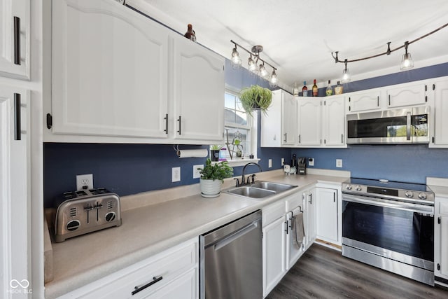 2116 Crimson Ln, Lebanon, IN 46052 - kitchen featuring white cabinets, stainless steel appliances, and a sink