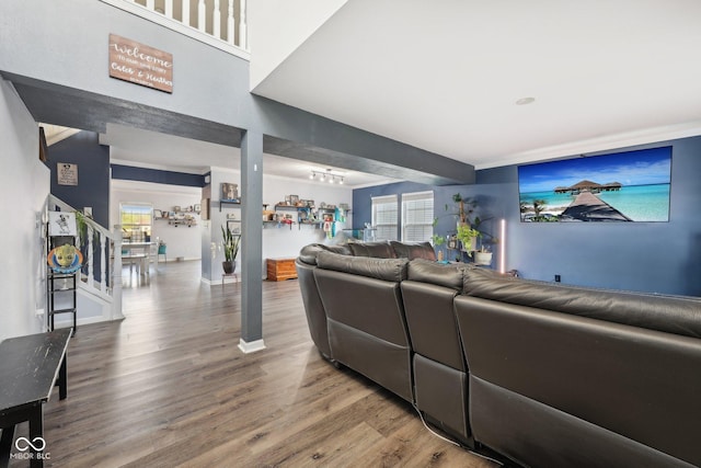 2116 Crimson Ln, Lebanon, IN 46052 - living room featuring baseboards, stairs, and wood finished floors