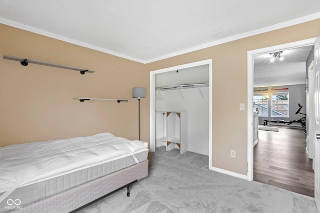 2116 Crimson Ln, Lebanon, IN 46052 - carpeted bedroom with crown molding and a closet