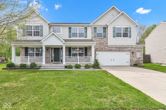 view of front of property featuring concrete driveway, a front yard, brick siding, and a garage