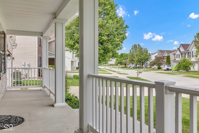 balcony with a porch and a residential view