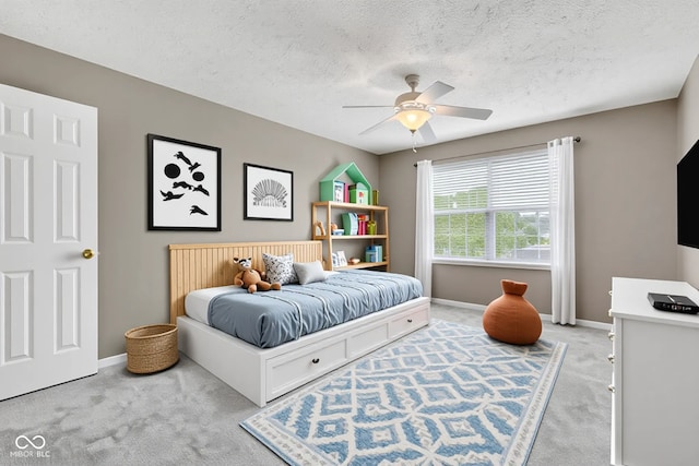 3652 Newberry Rd, Plainfield, IN 46168 - bedroom featuring light carpet, a textured ceiling, baseboards, and ceiling fan