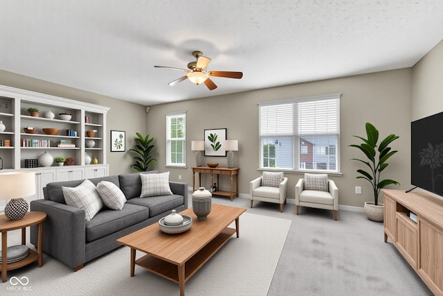 3652 Newberry Rd, Plainfield, IN 46168 - living area featuring ceiling fan, light colored carpet, and baseboards