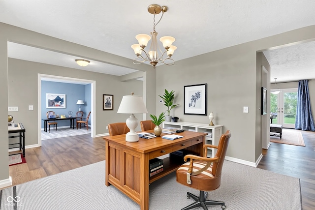 3652 Newberry Rd, Plainfield, IN 46168 - home office with wood finished floors, a chandelier, and baseboards