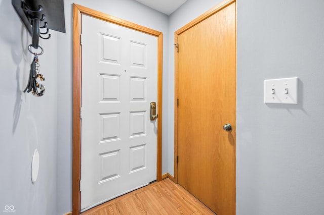 doorway with light wood-style floors