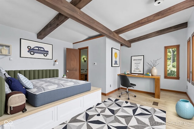 1686 Borders Rd, Nashville, IN 47448 - bedroom with light wood-type flooring, beamed ceiling, and baseboards