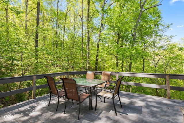 1686 Borders Rd, Nashville, IN 47448 - deck featuring outdoor dining area and a forest view