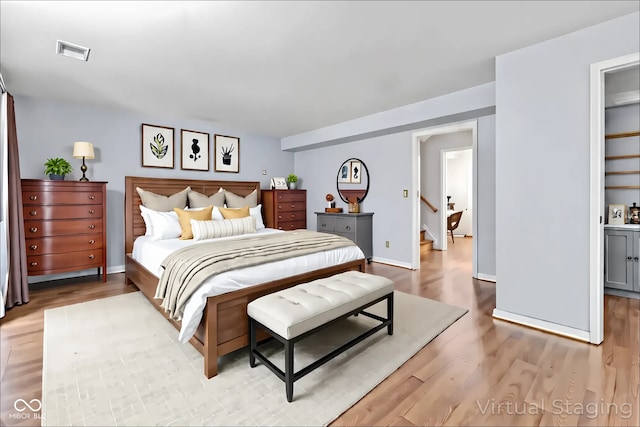 1686 Borders Rd, Nashville, IN 47448 - bedroom with light wood-style floors and baseboards
