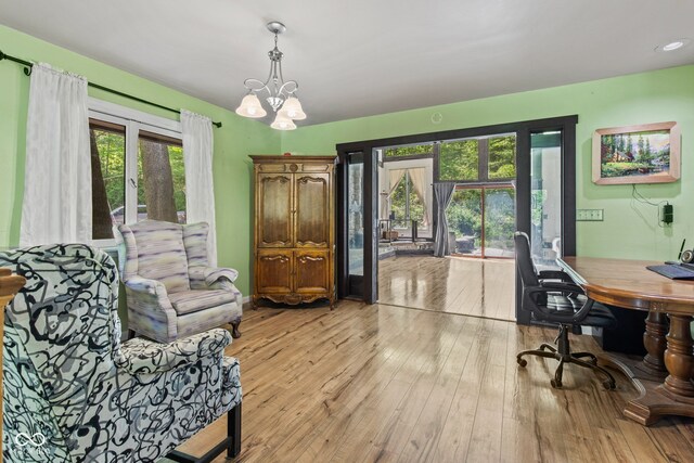 1686 Borders Rd, Nashville, IN 47448 - office space featuring french doors, light wood-style floors, and a chandelier