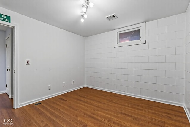 1686 Borders Rd, Nashville, IN 47448 - empty room featuring dark wood finished floors and baseboards