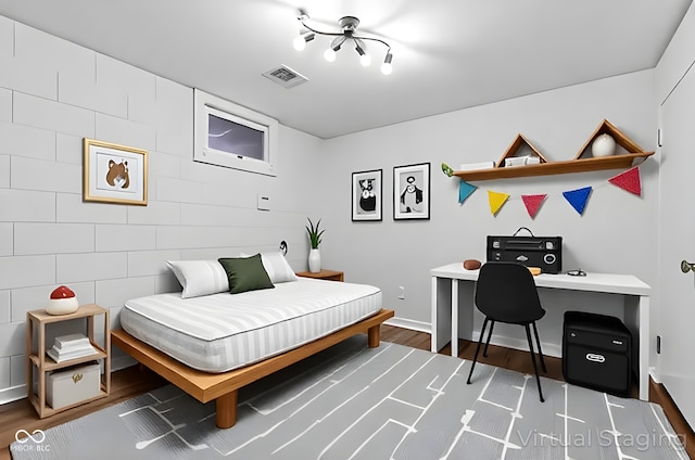 1686 Borders Rd, Nashville, IN 47448 - bedroom with wood finished floors, baseboards, and tile walls