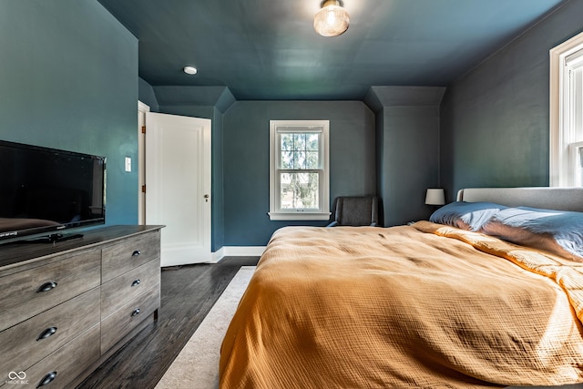 5124 N Capitol Ave, Indianapolis, IN 46208 - bedroom with dark wood-style flooring and baseboards