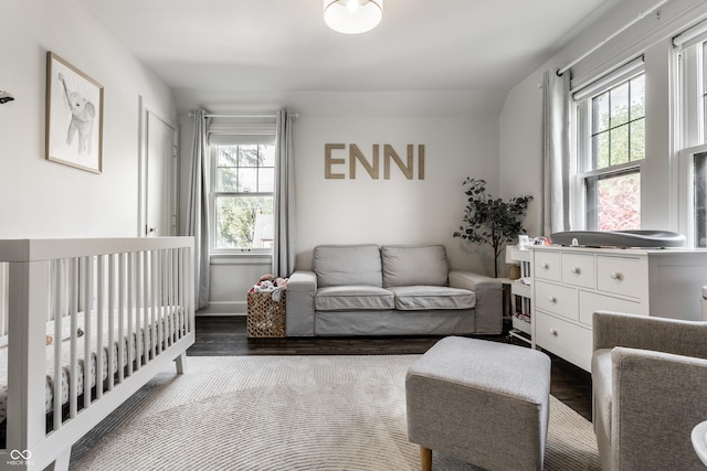 5124 N Capitol Ave, Indianapolis, IN 46208 - bedroom featuring a nursery area and wood finished floors