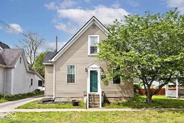 view of front of home with fence and entry steps