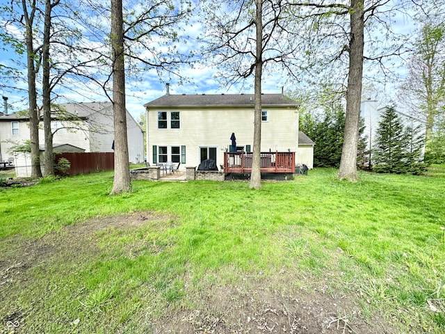4223 Kestrel Ct, Indianapolis, IN 46254 - rear view of property with a yard, a patio, fence, and a wooden deck