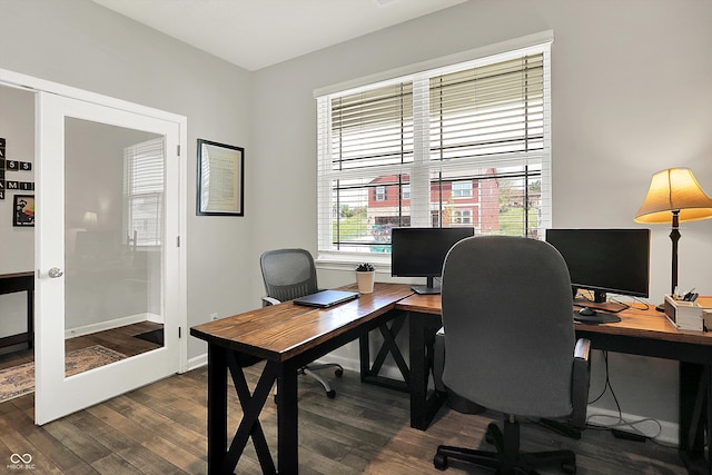 home office with baseboards, dark wood finished floors, and french doors