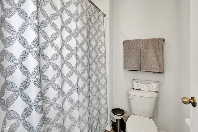 full bath featuring toilet