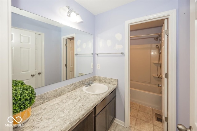 2006 Creek Bank Dr, Columbus, IN 47201 - bathroom with vanity, shower / washtub combination, and tile patterned floors