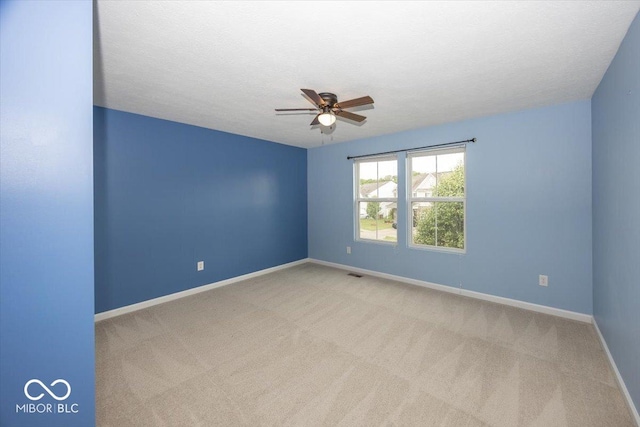 2006 Creek Bank Dr, Columbus, IN 47201 - carpeted empty room with a ceiling fan and baseboards