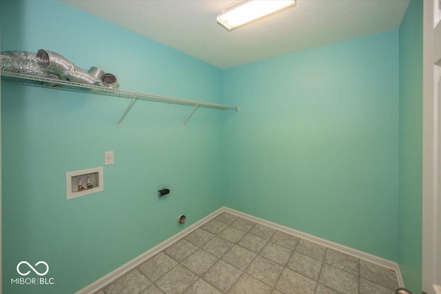 2006 Creek Bank Dr, Columbus, IN 47201 - laundry room featuring hookup for a washing machine, electric dryer hookup, and baseboards