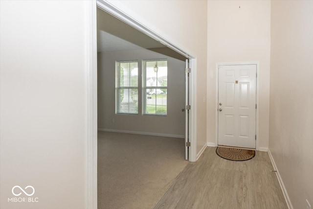 2006 Creek Bank Dr, Columbus, IN 47201 - entryway featuring light wood finished floors and baseboards