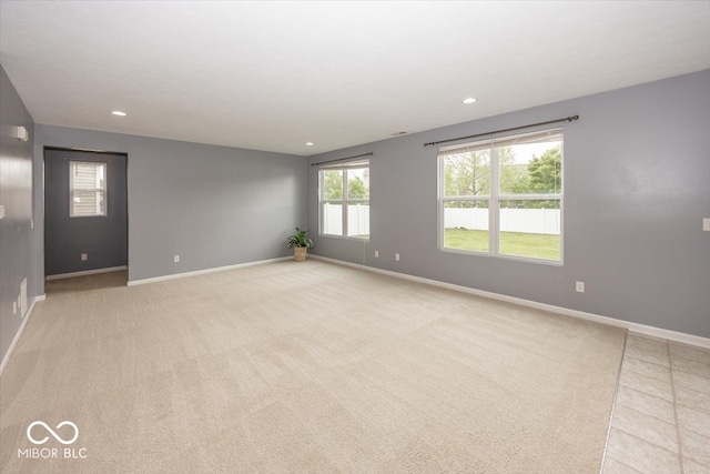 2006 Creek Bank Dr, Columbus, IN 47201 - empty room with baseboards, light carpet, and recessed lighting