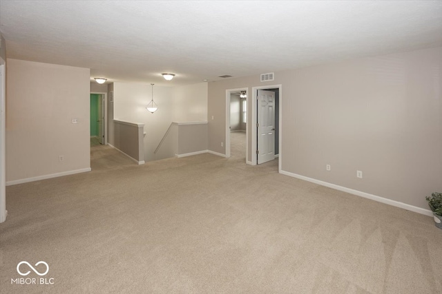 2006 Creek Bank Dr, Columbus, IN 47201 - spare room featuring light carpet and baseboards