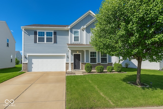 2006 Creek Bank Dr, Columbus, IN 47201 - view of front of home featuring board and batten siding, an attached garage, brick siding, and a front lawn