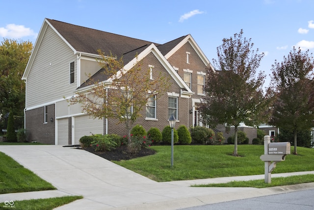 traditional-style home with an attached garage, concrete driveway, a front lawn, and brick siding