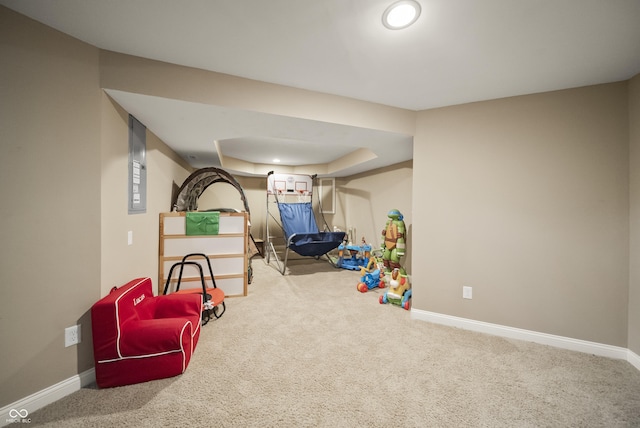 recreation room with carpet floors and baseboards