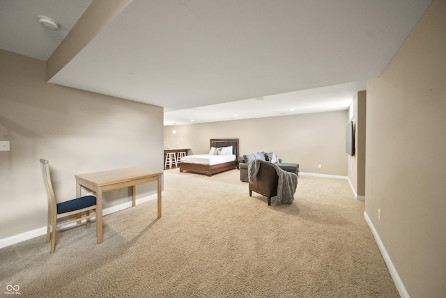 living room with baseboards, light carpet, and recessed lighting