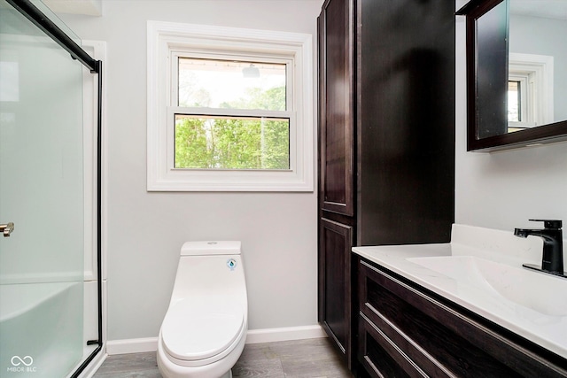 403 Hawthorn Dr, Crawfordsville, IN 47933 - full bath with vanity, baseboards, a shower stall, and toilet