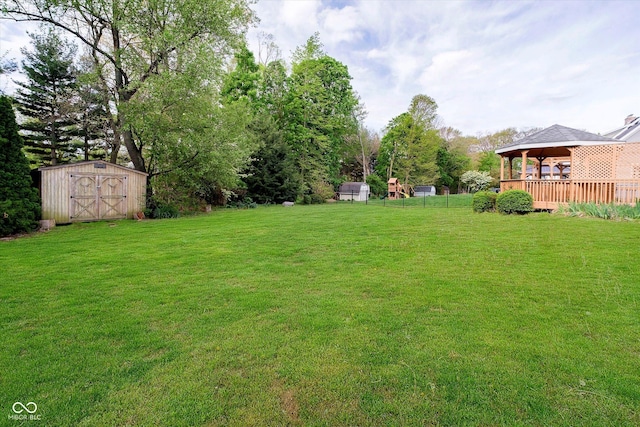 403 Hawthorn Dr, Crawfordsville, IN 47933 - view of yard with a gazebo, an outdoor structure, and a storage unit