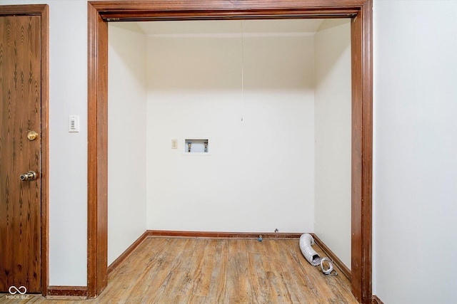 403 Hawthorn Dr, Crawfordsville, IN 47933 - clothes washing area featuring laundry area, light wood-style floors, baseboards, and washer hookup