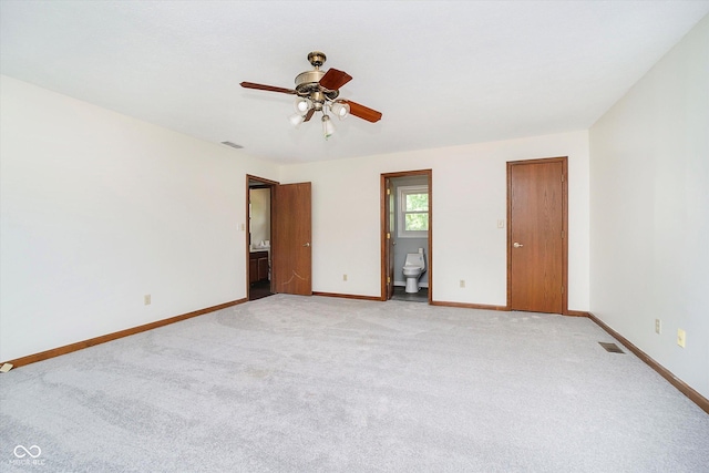 403 Hawthorn Dr, Crawfordsville, IN 47933 - unfurnished bedroom with baseboards, light colored carpet, and visible vents