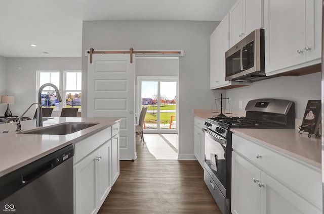 7645 Marin Pkwy, Cumberland, IN 46229 - kitchen featuring a sink, plenty of natural light, stainless steel appliances, and recessed lighting