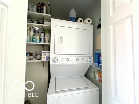 laundry room featuring laundry area and stacked washer and dryer