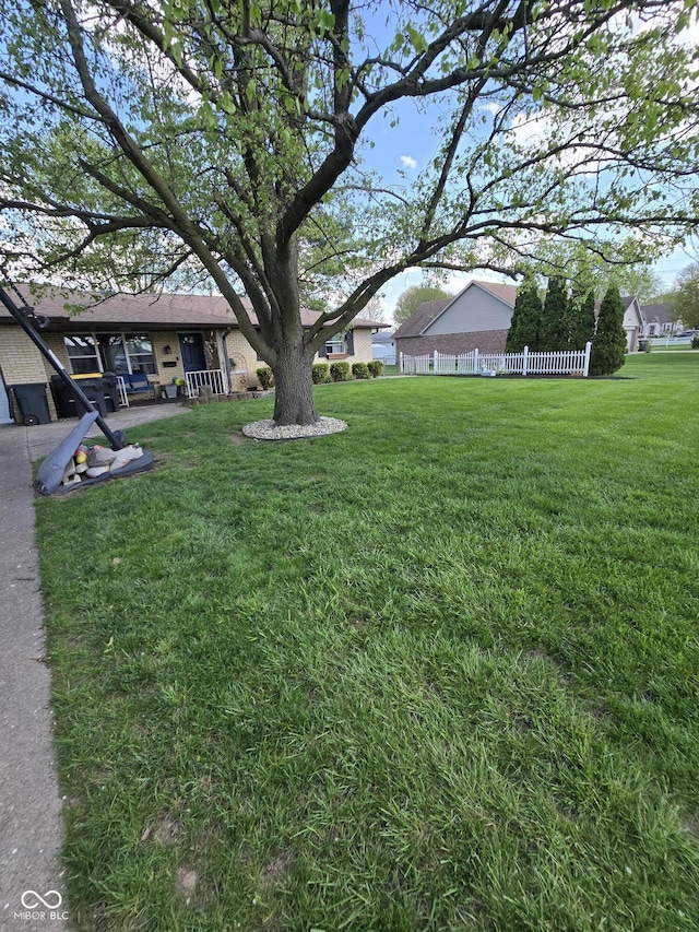 view of yard with fence